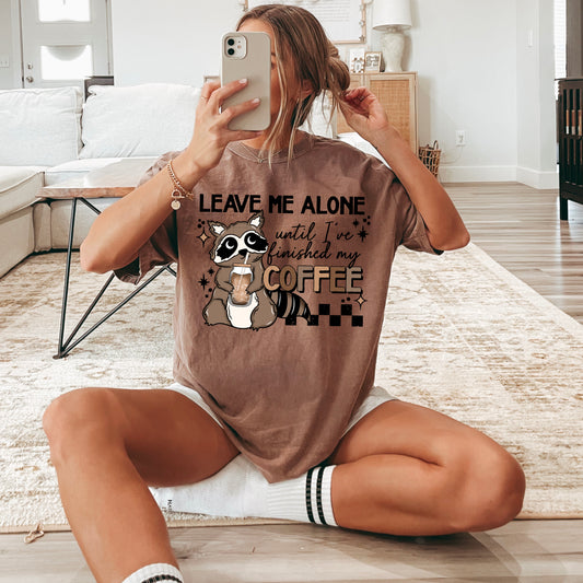 Leave me alone until I finish my coffee racoon